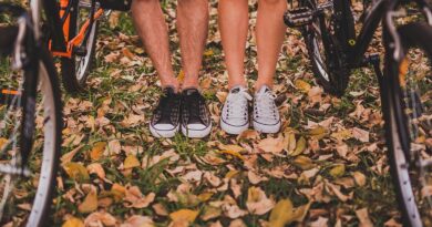 pair, man, woman, bicycles, bikes, cyclists, legs, shoes, sneakers, footwear, together, relationship, adult, autumn, nature, autumn leaves, couple, fall, fashion, feet, garden, grass, leaves, leisure, outdoors, people, recreation, wear