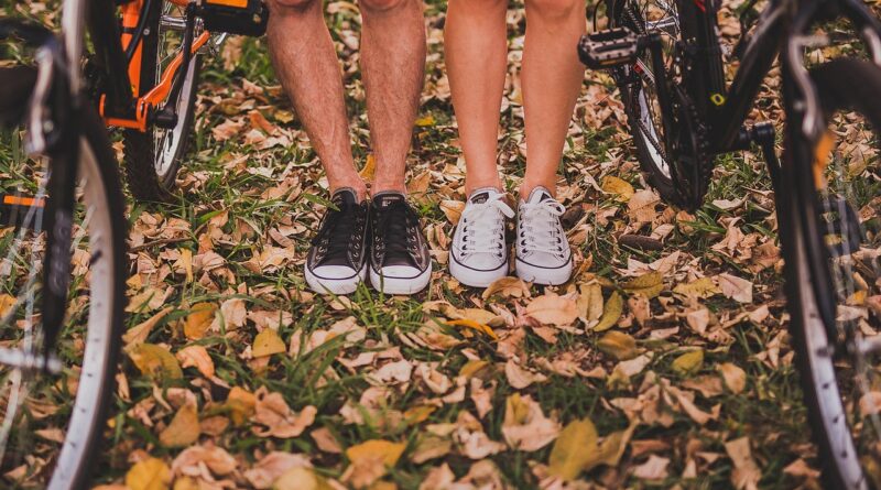 pair, man, woman, bicycles, bikes, cyclists, legs, shoes, sneakers, footwear, together, relationship, adult, autumn, nature, autumn leaves, couple, fall, fashion, feet, garden, grass, leaves, leisure, outdoors, people, recreation, wear