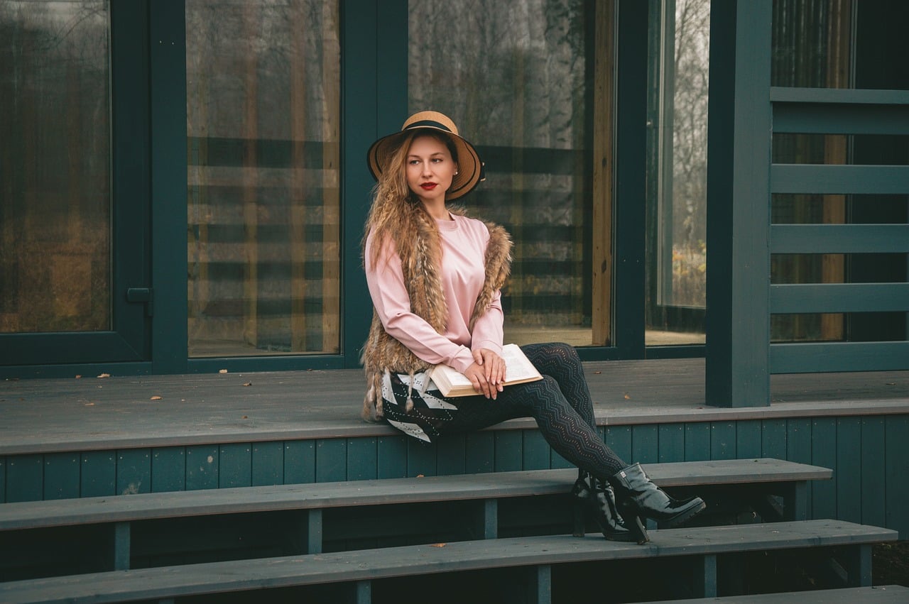 woman, autumn, nature, hat, fashionable, posing, blonde, wood, sweater, platform, stairs, urban, casual, skirt, reading, outdoor, seating, styling, elegant, lifestyle