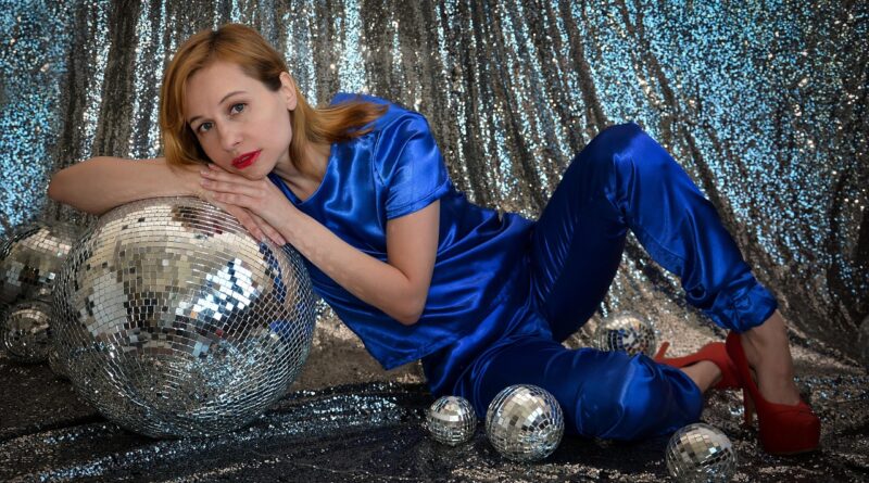 woman, model, portrait, blue outfit, fashion, modeling, pose, posing, disco ball, young woman, female, disco, sequins, club, ball, celebration, party