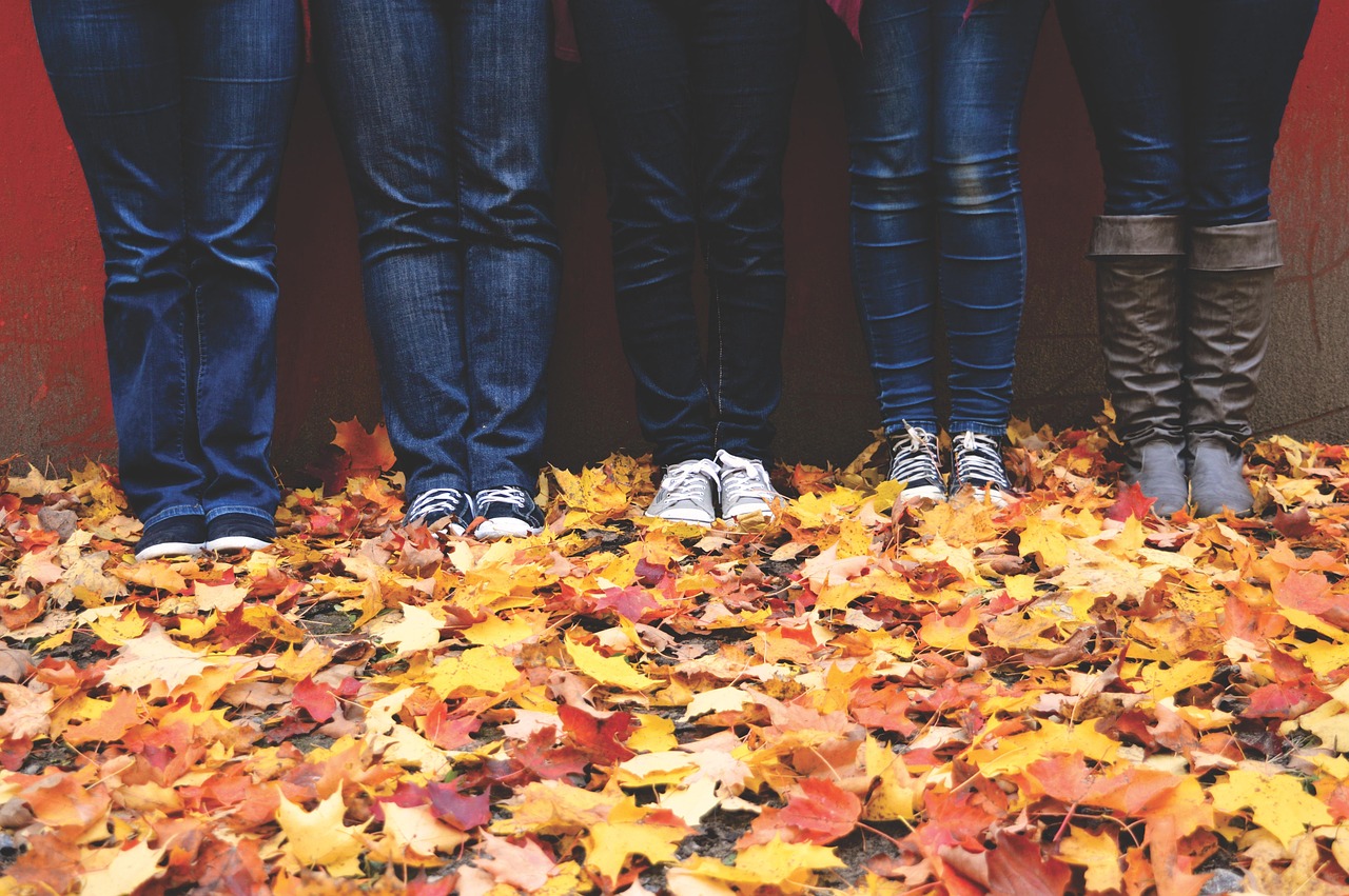 autumn, boots, daylight, denim jeans, environment, fall, footwear, group, leaf, leaves, maple, outdoors, people, nature, sneakers