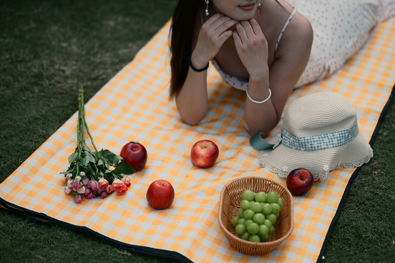 picnic, nature, apples, grapes, flowers, beautiful flowers, hat, blouse, picnic blanket, grass, relaxation, leisure, summer, outdoors, fruit, flower background, flower wallpaper, woman, laying, summer clothing, picnic in park, still life, vintage style, clear day