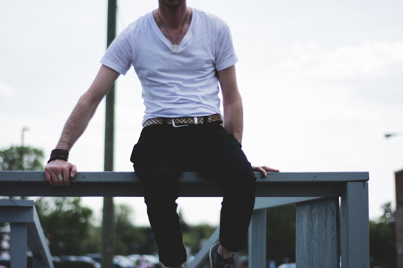 white, tshirt, vneck, fashion, guy, man, people, lifestyle, sitting, pants, belt, tshirt, tshirt, tshirt, tshirt, tshirt, belt