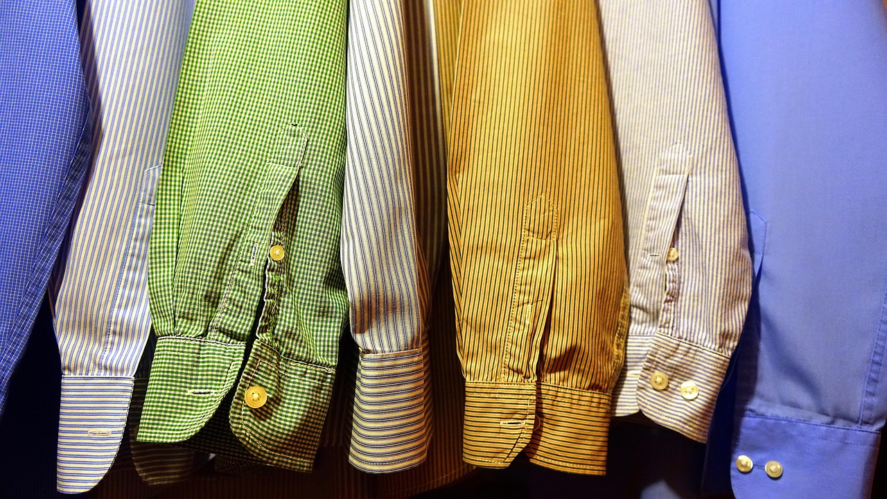 shirt, clothing, clothes, textile, design, style, casual, apparel, fashion, wardrobe, man, fabric, collection, hanger, wear, rack, closet, colorful, garment, cotton, cloth, white, variety, outfit, hang, fashionable, male, modern
